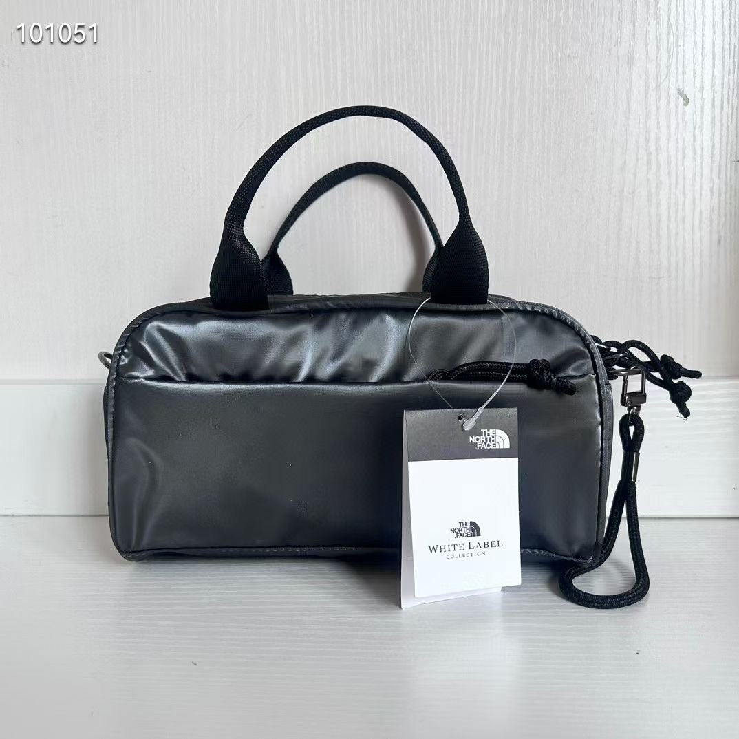 TNF 手挽斜咩袋