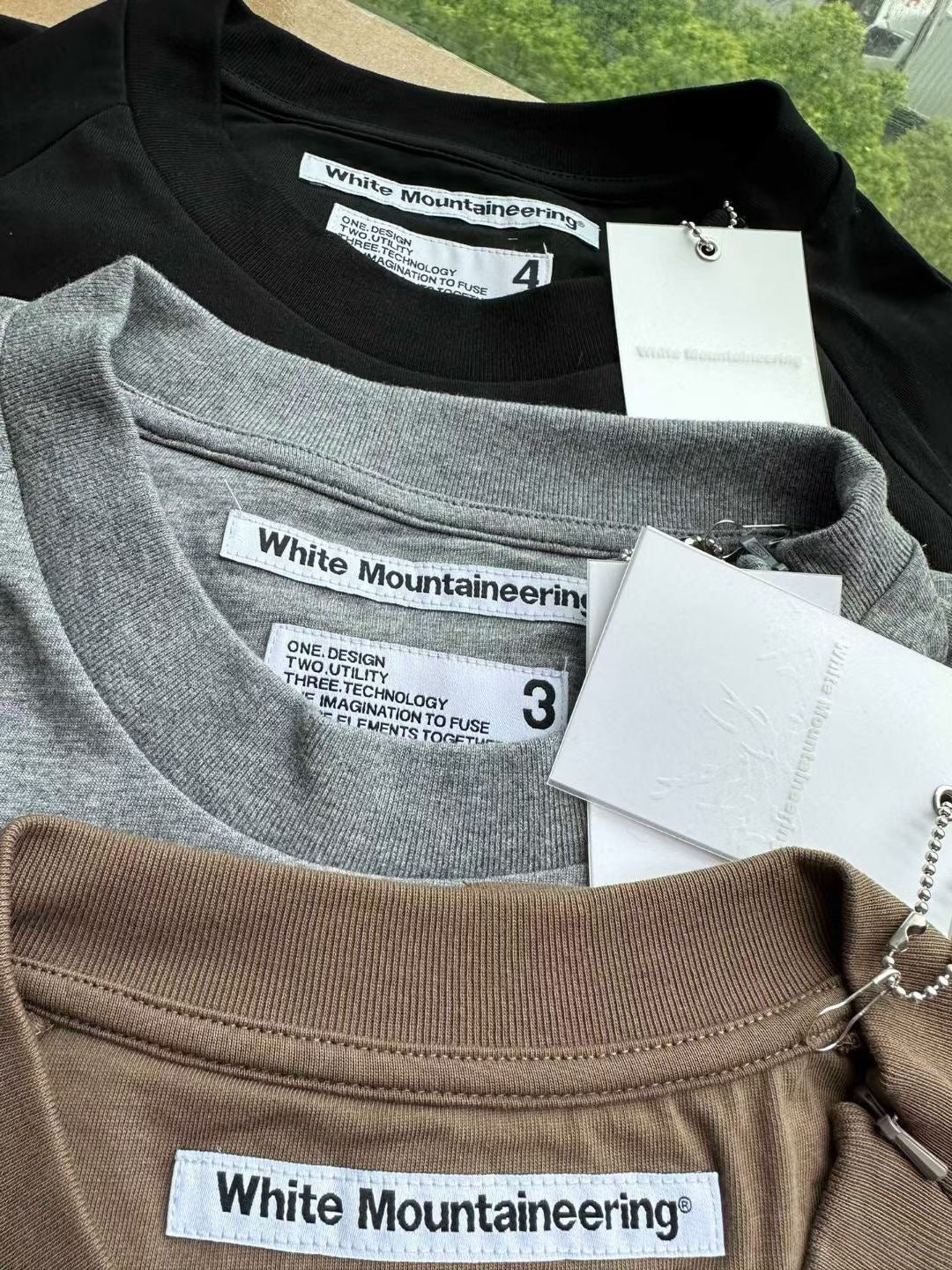 日單white mountaineering tee