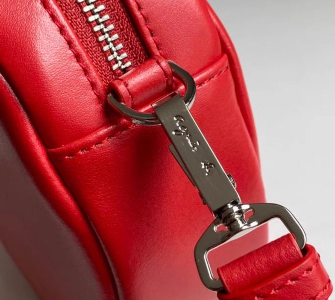 Agnes b 牛皮圓餅袋