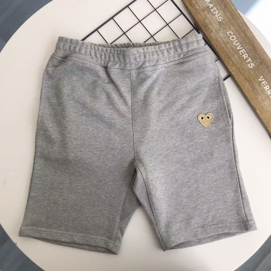 CdG play 金色心心短褲