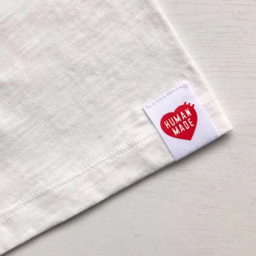 Human made dog tee