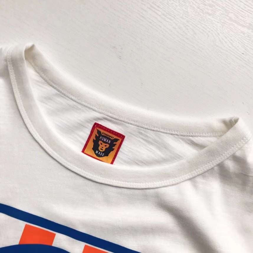 Human made dog tee