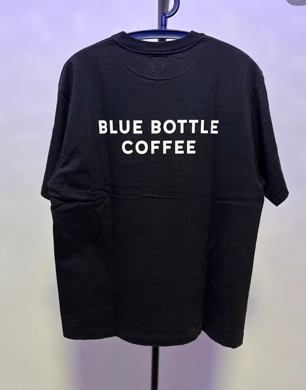 Human made blue bottle tee