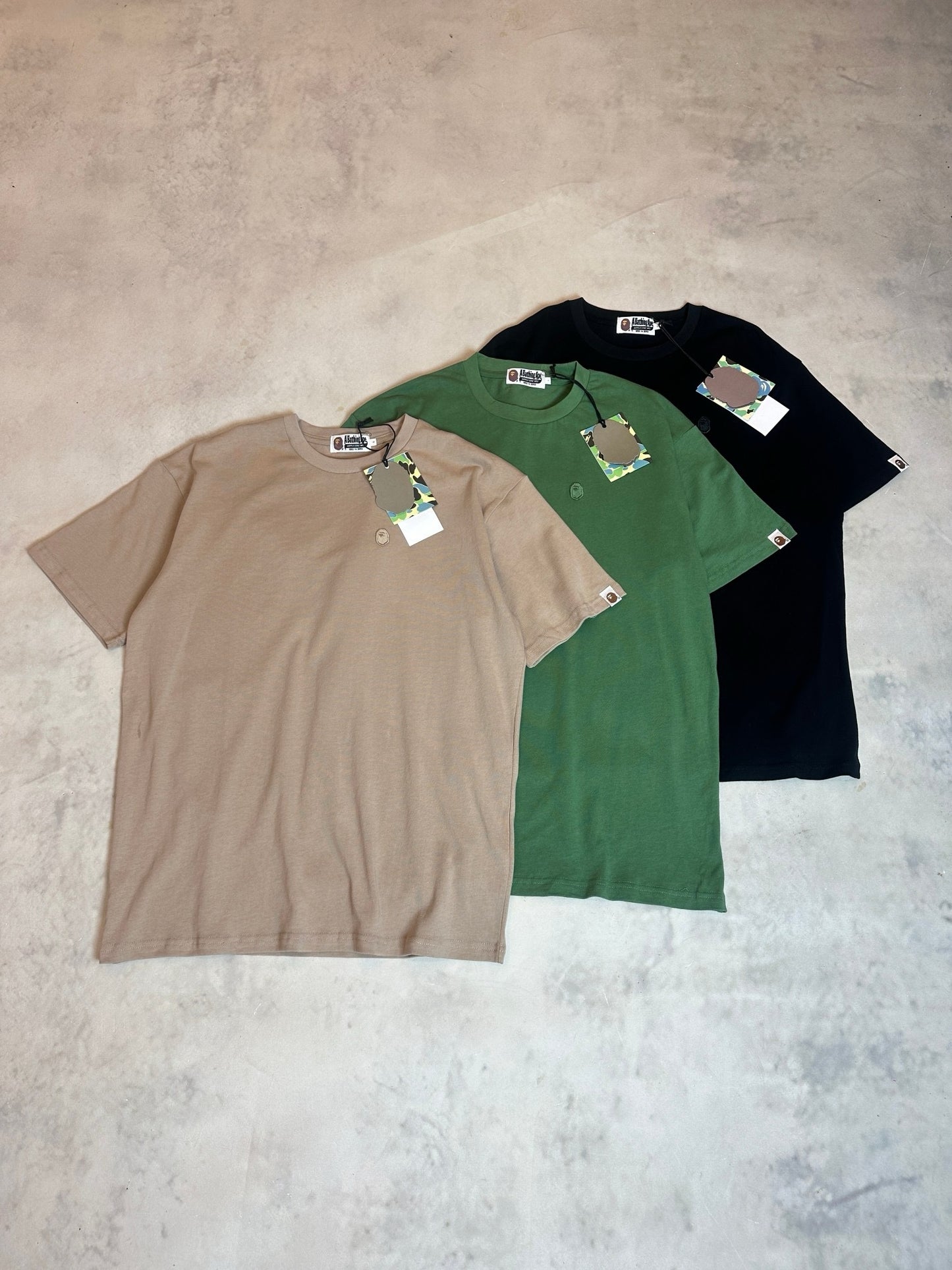 A bathing ape 猿人logo tee