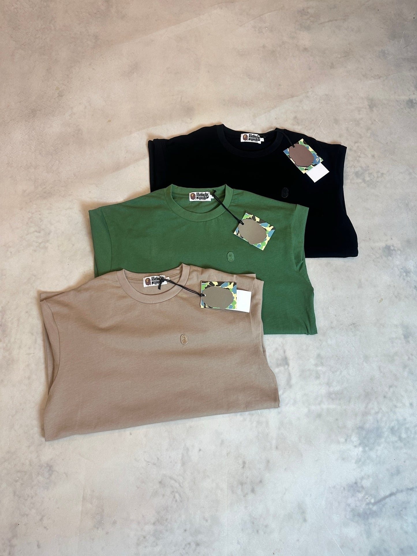 A bathing ape 猿人logo tee