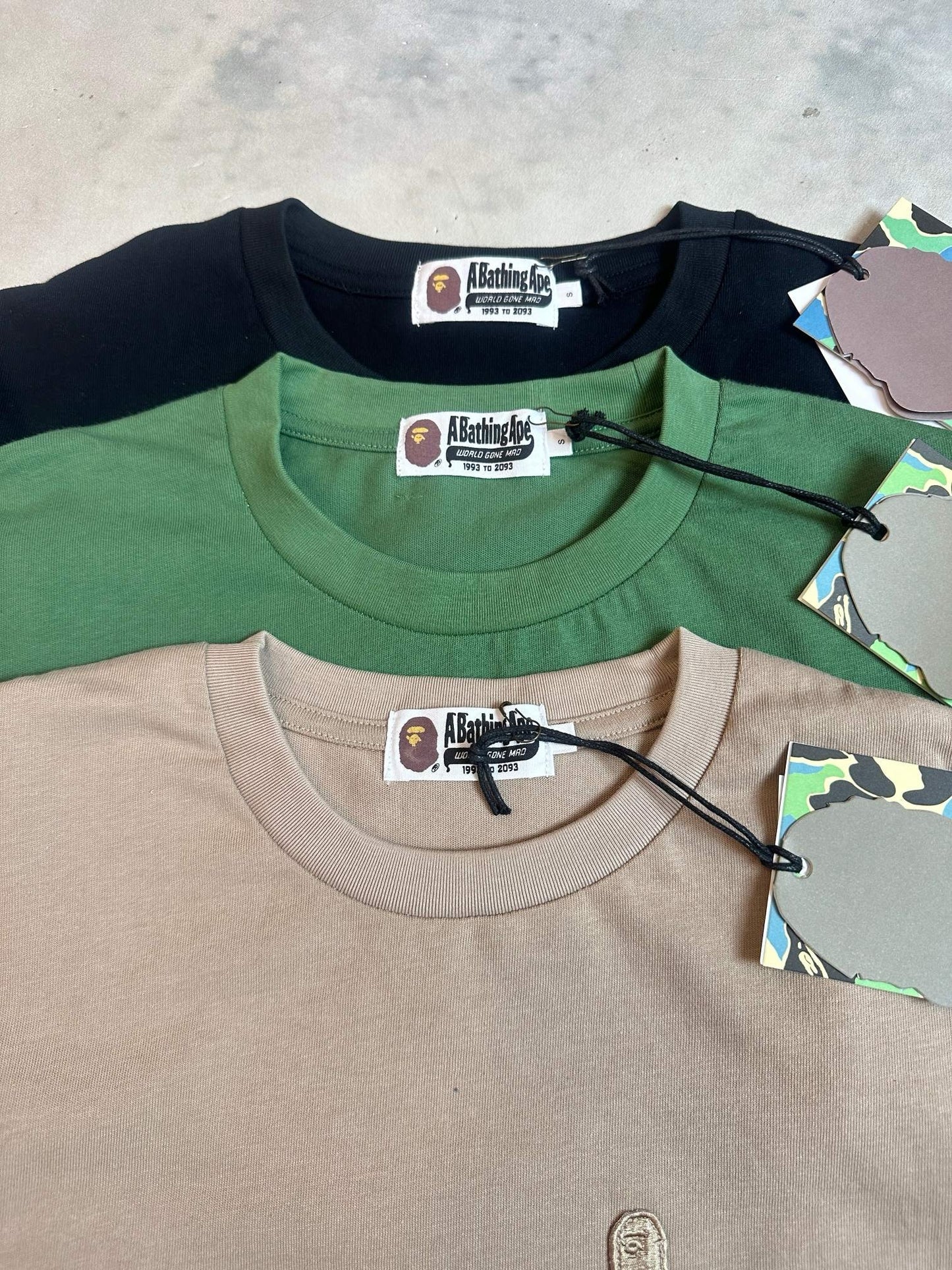A bathing ape 猿人logo tee