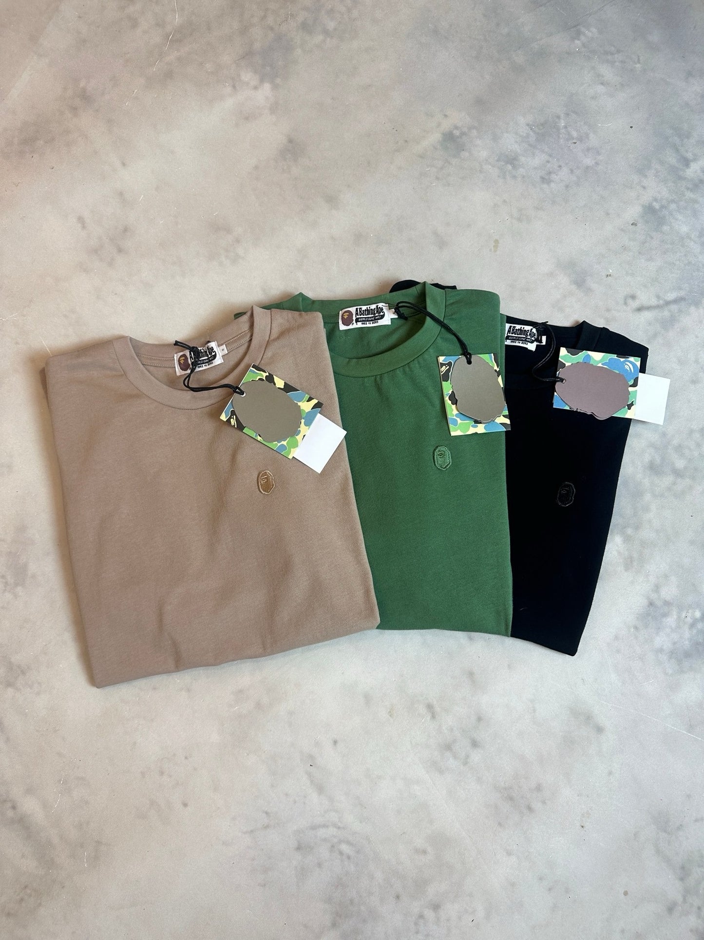 A bathing ape 猿人logo tee