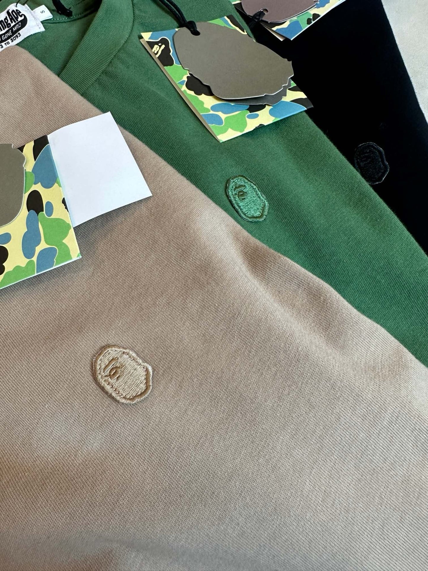 A bathing ape 猿人logo tee