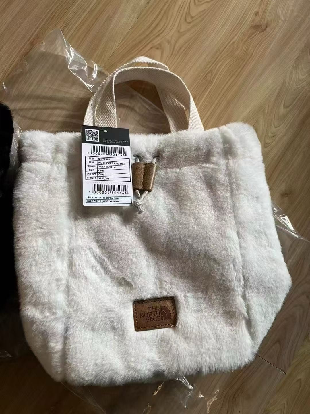 TNF 仿兔毛斜咩手挽袋