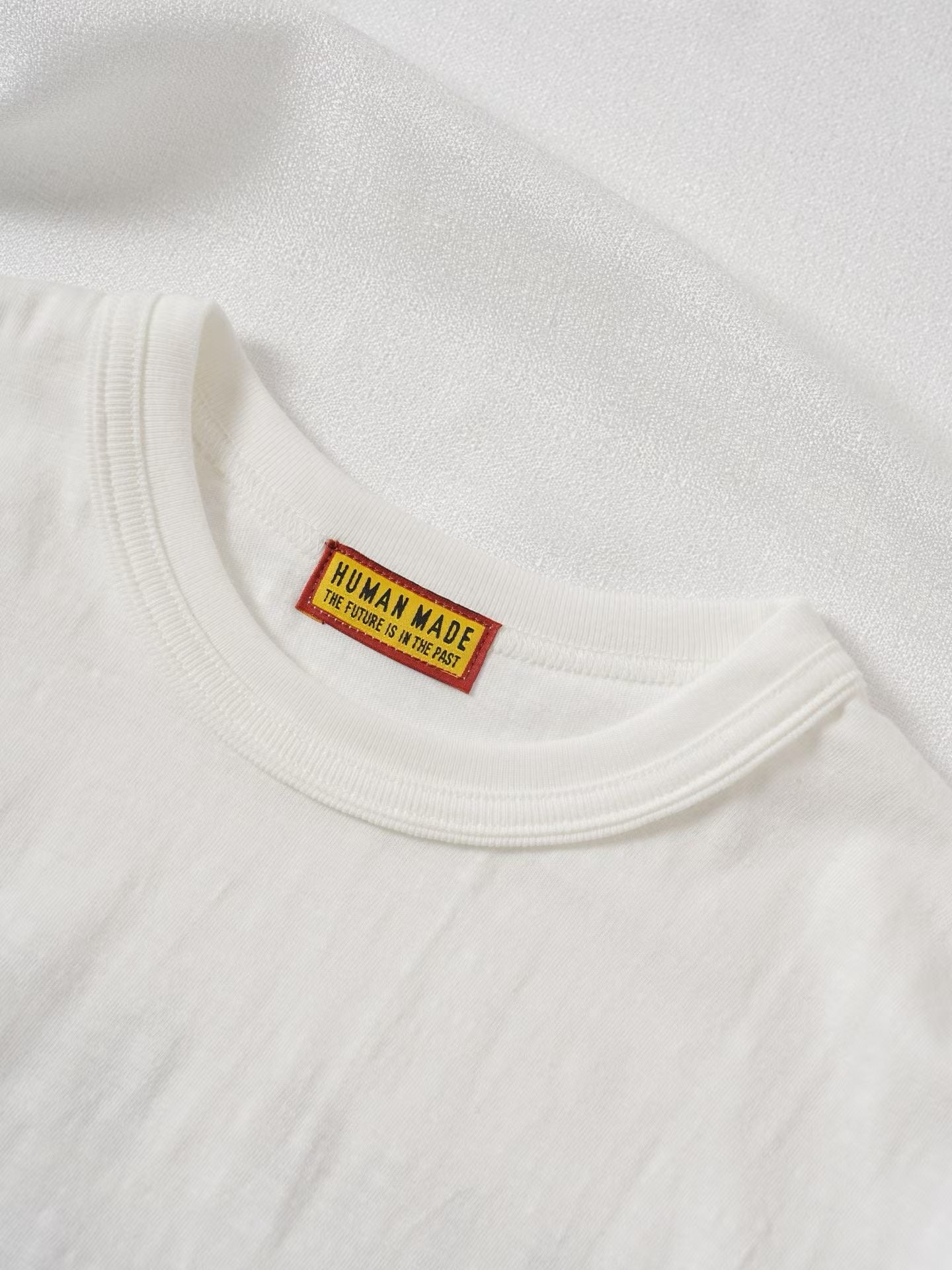 Human made blue bottle tee